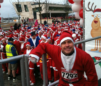 Craig doing charity run in santa costume